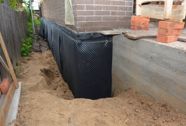 Happy homeowners after waterproofing job in Rosewood